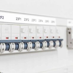 Close-up of an electrical breaker panel with labeled switches, featuring white housings and red indicators—reliably protected and ideal for use with specialized products like Electronic Cleaning Agent | MS-730L Contact Re-Nu®.